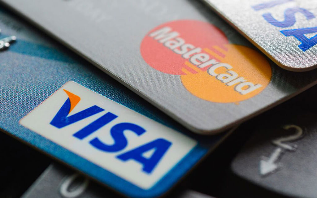 Stack of Visa and MasterCard credit cards